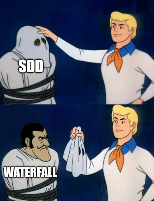 Scooby-Doo unmasking meme where a ghost labeled "SDD" is revealed to be "Waterfall", illustrating that SDD is essentially a form of the waterfall model.